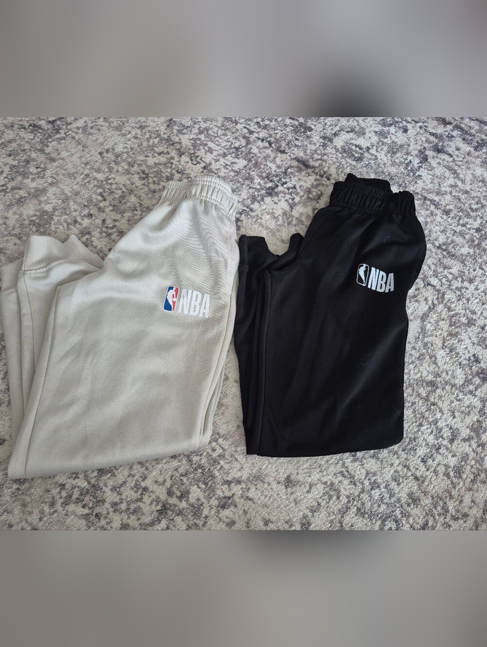 NBA pair of sweats boys size 10/12. Logo is peeling as seen in pics